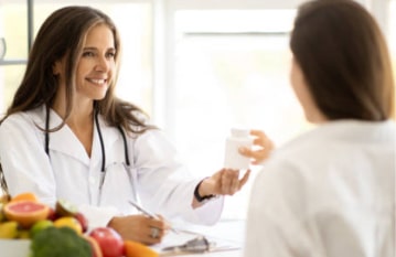 image of a doctor with pills